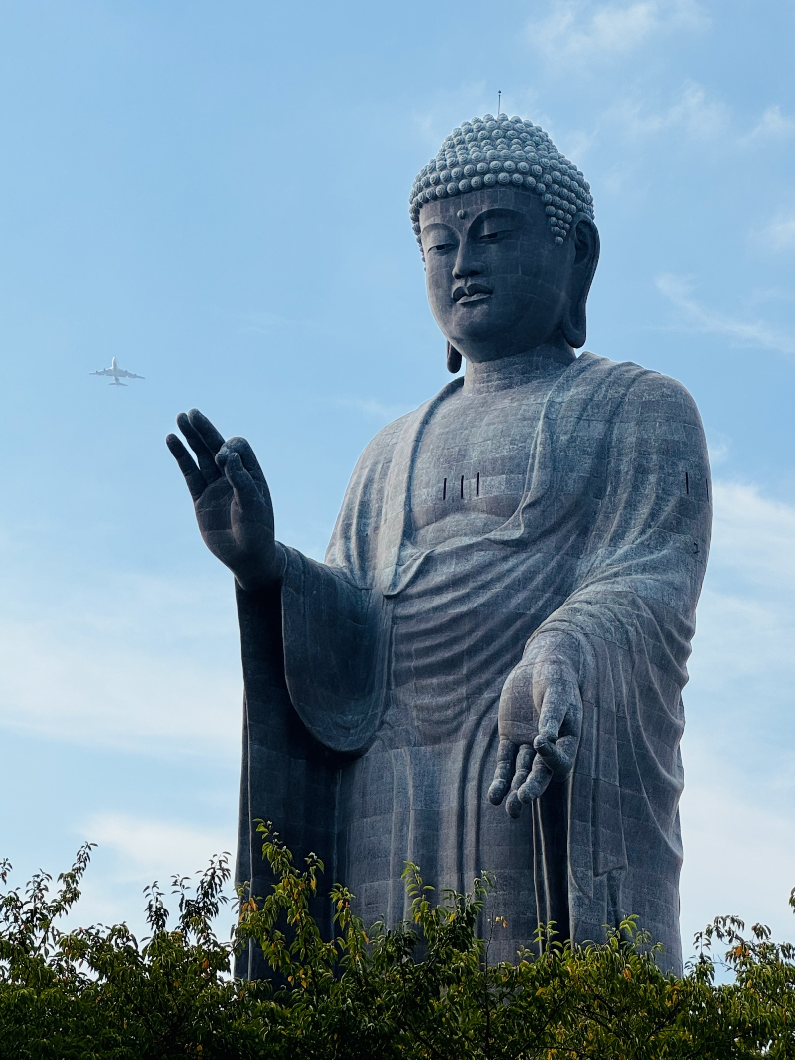 Ushiku Daibutsu with plane